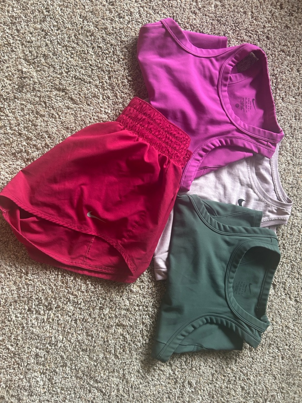 3 Nike tank tops - 1 Nike Shorts